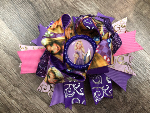 Purple and pink princess inspired bow